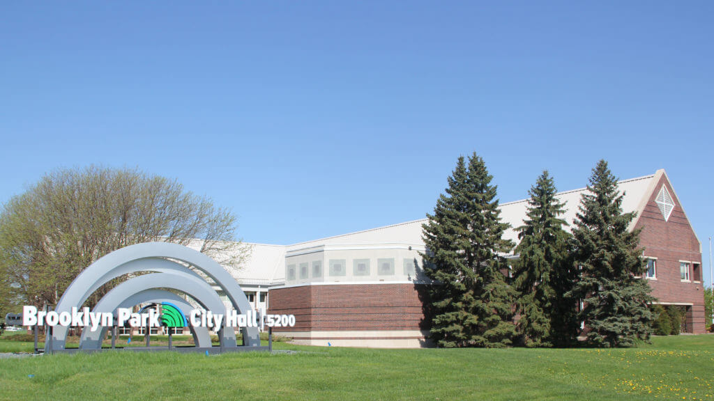 Open Government Brooklyn Park city hall and sign