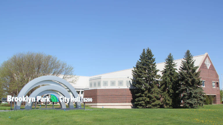 Open Government Brooklyn Park city hall and sign