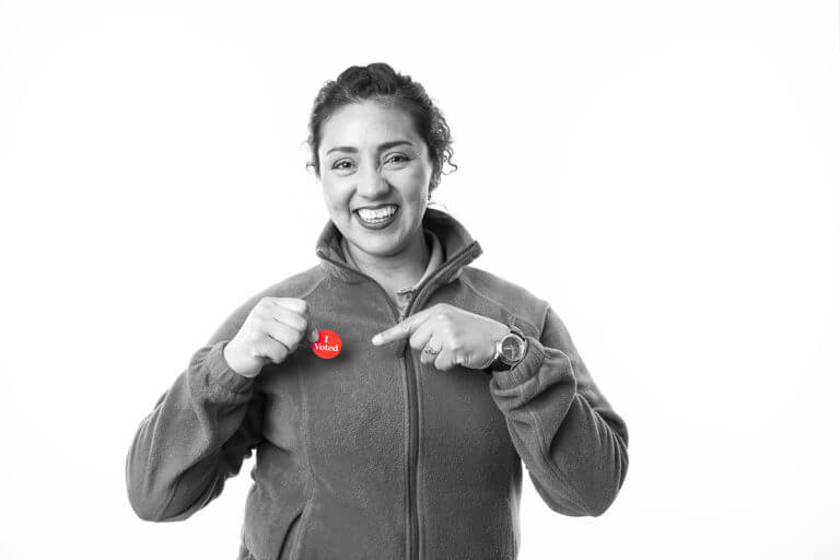 woman with i voted sticker