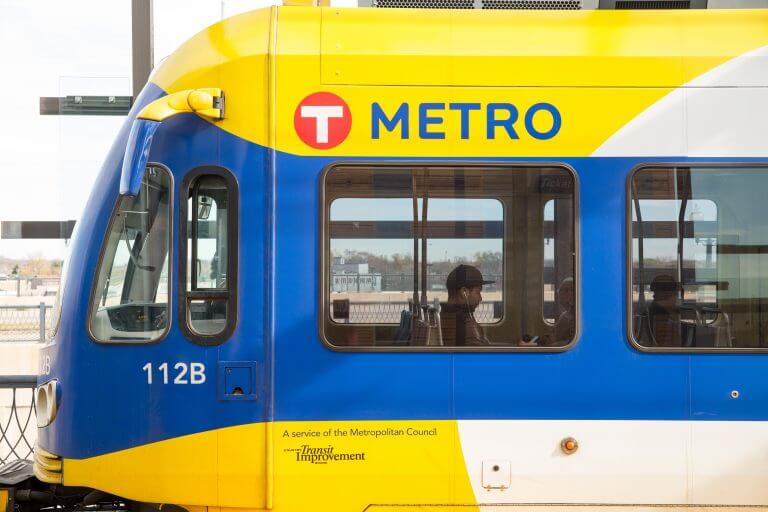 Light rail train stopped at station