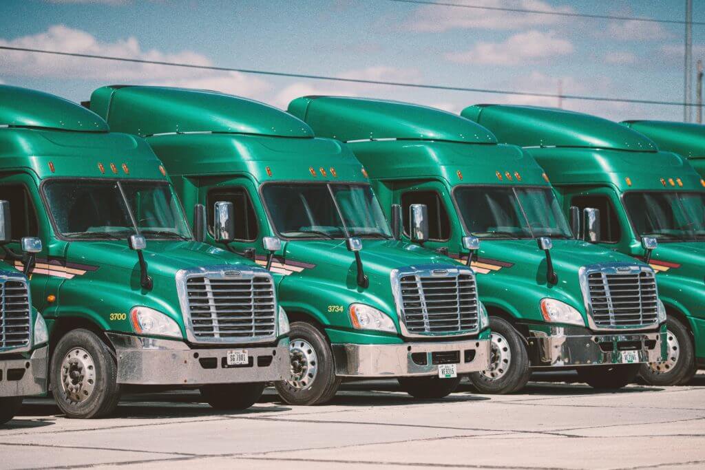 Row of green trucks