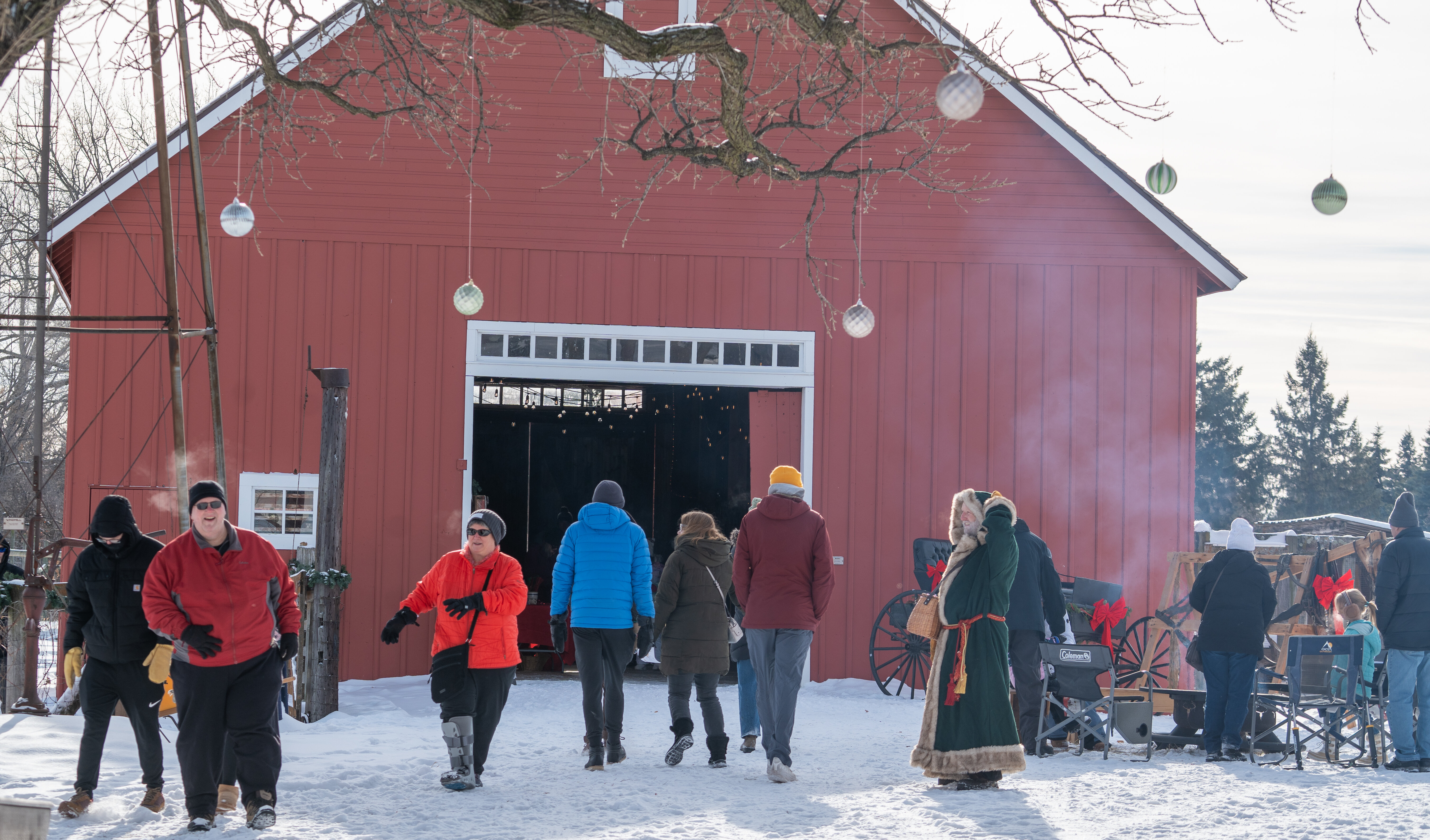 People on a farm during winter.